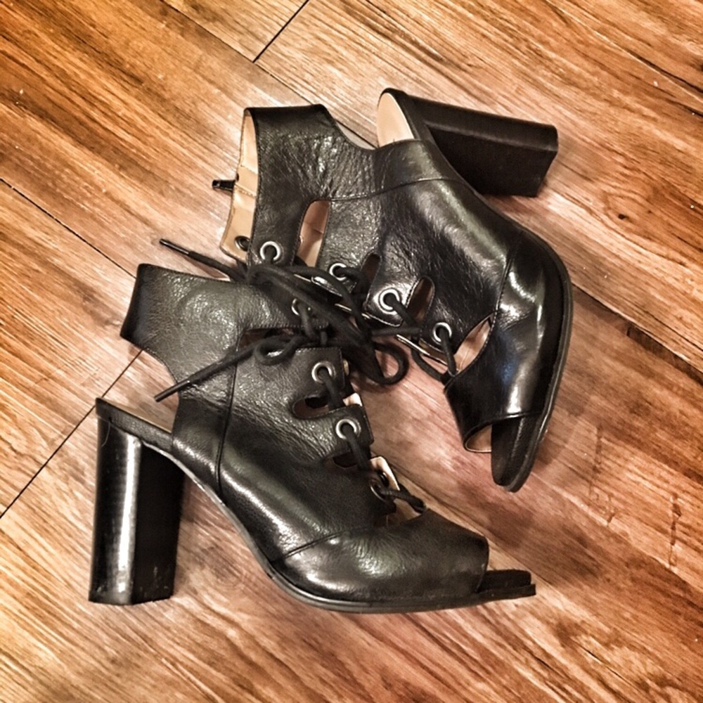 NINE WEST peep toe lace up heels.